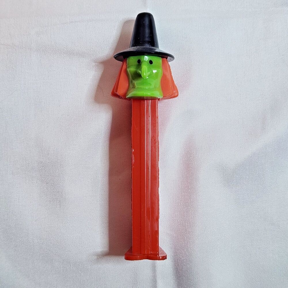 Vintage Pez Witch Dispenser Slovenia Green Face Orange Hair Red Stem Halloween